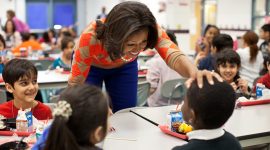First Lady Michelle Obama has lunch with students at Parklawn Elementary School in Alexandria, Va., Jan. 25, 2012. The First Lady and Agriculture Secretary Tom Vilsack visited the school to sample a healthy meal that meets the United States Department of AgricultureÕs new and improved nutrition standards for school lunches. (Official White House Photo by Chuck Kennedy)

This official White House photograph is being made available only for publication by news organizations and/or for personal use printing by the subject(s) of the photograph. The photograph may not be manipulated in any way and may not be used in commercial or political materials, advertisements, emails, products, promotions that in any way suggests approval or endorsement of the President, the First Family, or the White House.Ê