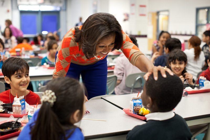 First Lady Michelle Obama has lunch with students at Parklawn Elementary School in Alexandria, Va., Jan. 25, 2012. The First Lady and Agriculture Secretary Tom Vilsack visited the school to sample a healthy meal that meets the United States Department of AgricultureÕs new and improved nutrition standards for school lunches. (Official White House Photo by Chuck Kennedy)

This official White House photograph is being made available only for publication by news organizations and/or for personal use printing by the subject(s) of the photograph. The photograph may not be manipulated in any way and may not be used in commercial or political materials, advertisements, emails, products, promotions that in any way suggests approval or endorsement of the President, the First Family, or the White House.Ê